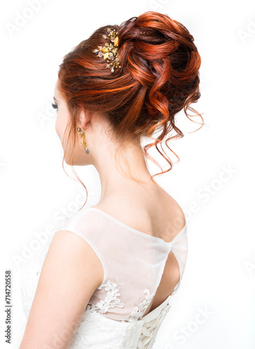 Young pretty caucasian bride in wedding dress