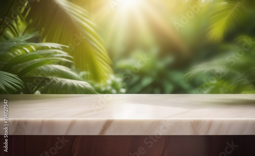 Empty marble tabletop counter on blur jungle tropical leaves. Contemporary backdrop for product presentation, podium, pedestal, blurred lush foliage. Showcase, display case. Minimal modern background.