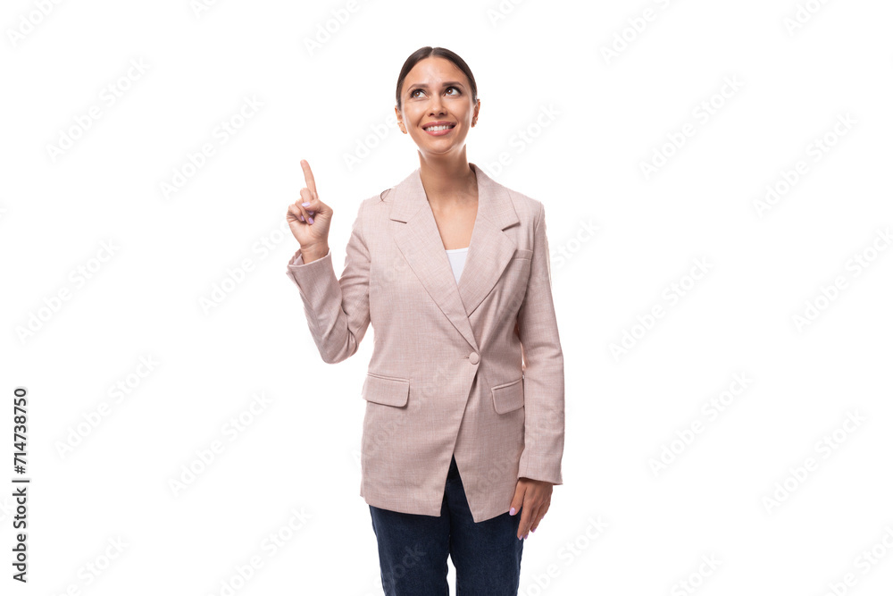 successful pretty 30 year old business woman with black hair wearing a beige jacket on a white background with copy space successful pretty 30 year old business woman with black hair wearing a beige jacket on a white background with copy space