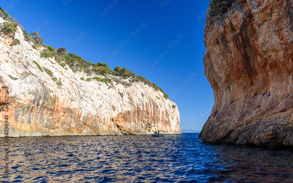 Small inlet along the cliffed coast in the Baunei area in east Sardinia called Portu Cuau, literally translated as Hidden Harbor.