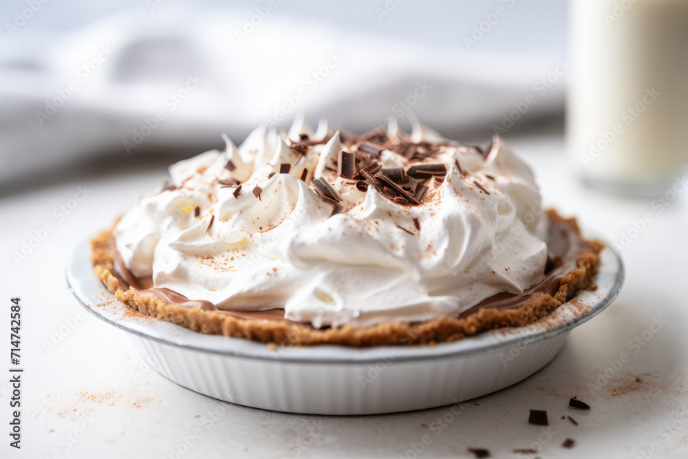 Chocolate Cream Pie on a White Kitchen Counter Chocolate Cream Pie on a White Kitchen Counter