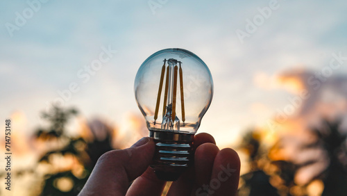 A light bulb of energy that allows us to live together with technology. photo