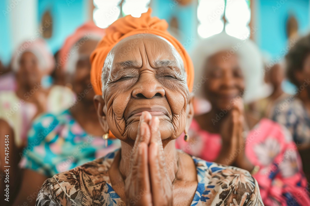 Old Woman Praying in Church Eyes Closed. Latina Old Women Praying in a Church. Religious Concept.
