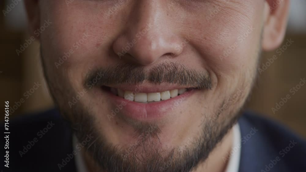 Man's Smiling Face with a Gesture for Silence Man's Smiling Face with a Gesture for Silence
