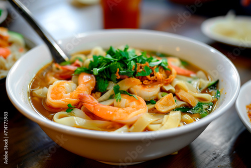 Thai food wide noodles in gravy seafood or rad na