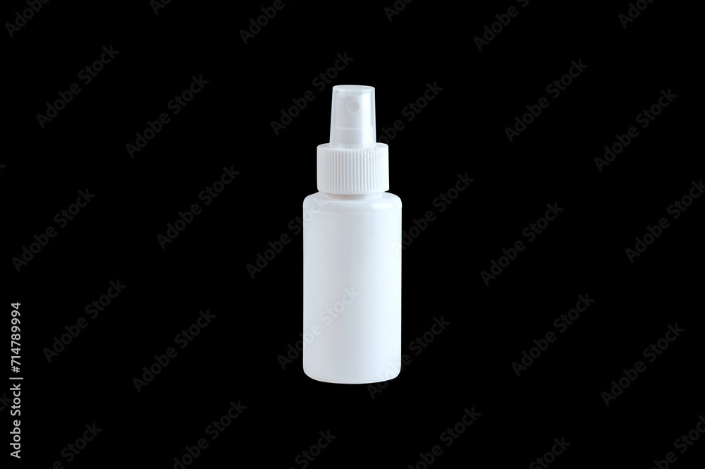 Spray bottle isolated on black background Spray bottle isolated on black background