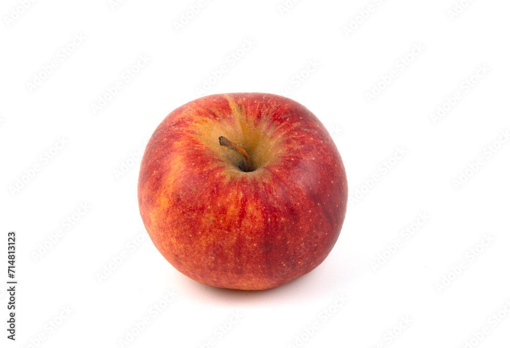 Red apple isolated on a white one. Close-up of the fruit. Red apple isolated on a white one. Close-up of the fruit.