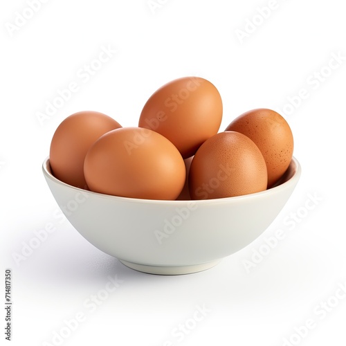 Brown eggs in a bowl isolated on white background