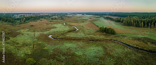 Sunrise among meadows and forests on the Suprasl River in Podlasie on an autumn ,september day.
