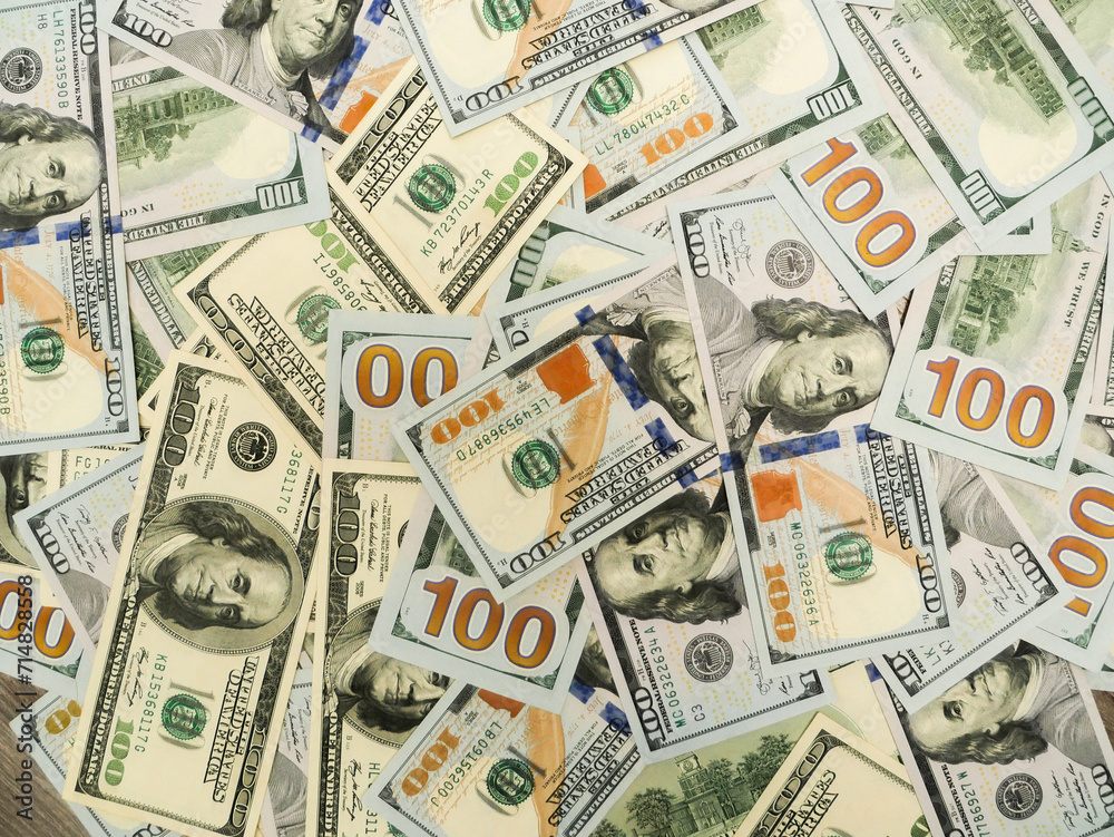 Background of 100 dollar bills, top view. Background of 100 dollar bills, top view.