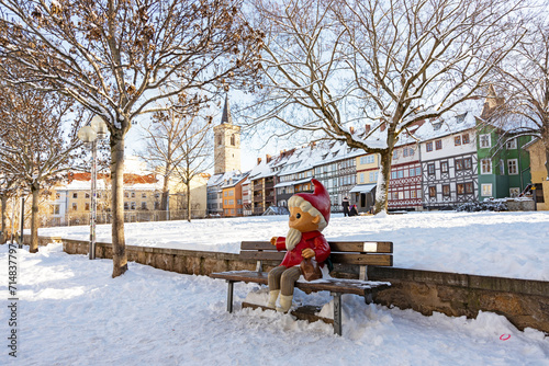 Sandman statue in front of the merchants bridge in Erfurt in winter