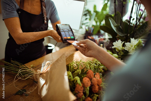 Florist shop transaction with credit card payment photo