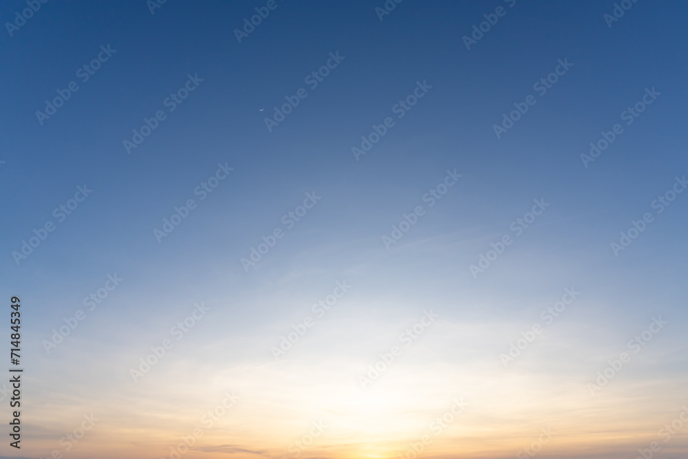 Beautiful morning or evening blue and orange sky taken at the sea used as natural blackground texture