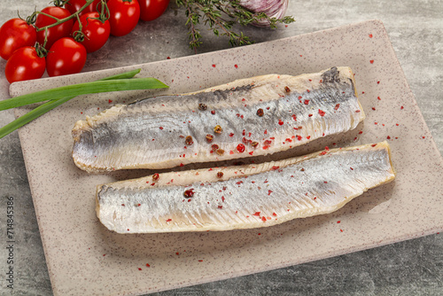 Marinated herring fillet with green onion