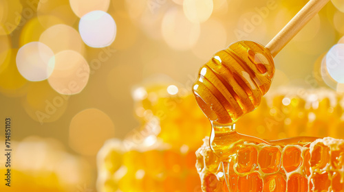 Golden Honey Dripping from Dipper onto Honeycomb 