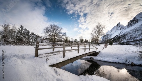 little bridge and snow covered landscape © Kendrick
