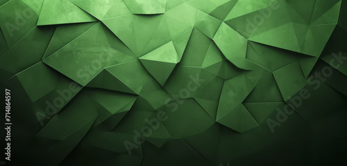 Textured green geometric shapes on a dark background. photo