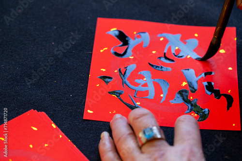 China, Spring Festival, calligrapher, handwritten Spring Festival couplets, brush characters, Chinese Spring Festival,