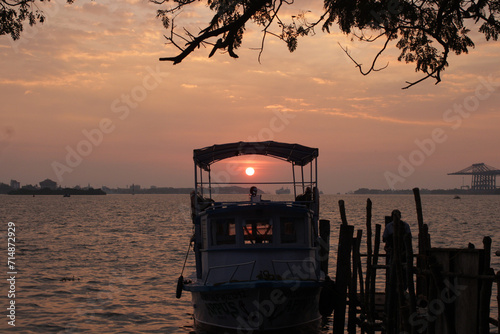Sunsetting Through Boat