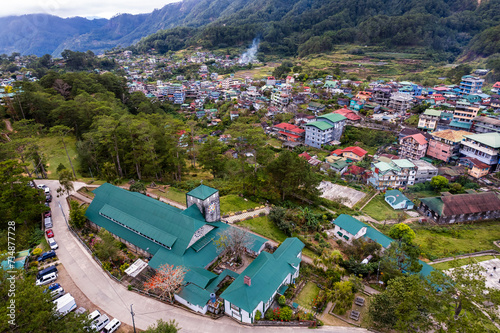 Sagada, Mountain Province, Philippines - Aerial of the highland tourist town of Sagada and Saint Mary Church. photo