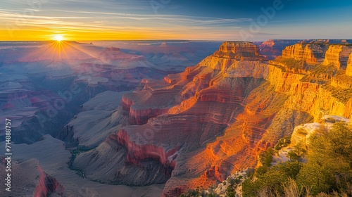 Soar above the Grand Canyon at sunrise, where the first light of Easter morning paints the canyon walls in hues of gold and red.