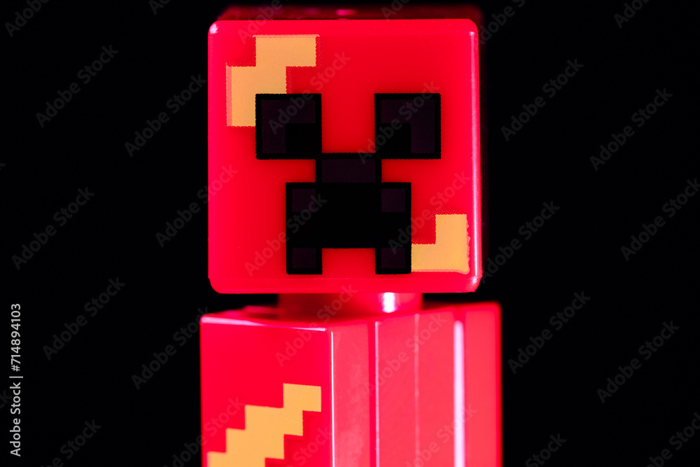 Naklejka premium LEGO Minecraft Lava Creeper Mob on the black background