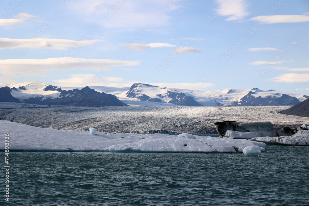 Iceland-Iceberg in Jökulsárlón glacier lagoon with Vatnajökull National Park in the background