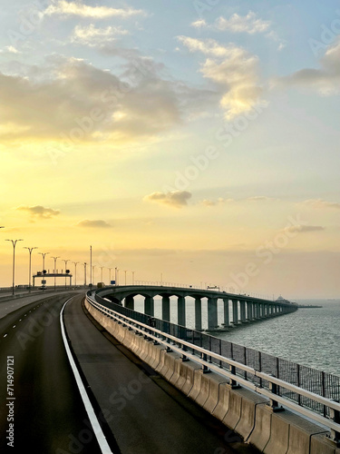 the famous Hong kong-Zhuhai-Macau Brdige or HZMB, the longest bridge in the world spanning accross 50 km above and under the ocean. Taken during beautiful sunset. © Timothy Roesdiah
