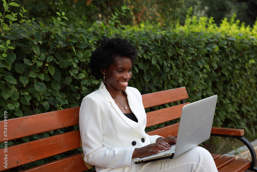 happy african businesswoman working with laptop happy african businesswoman working with laptop
