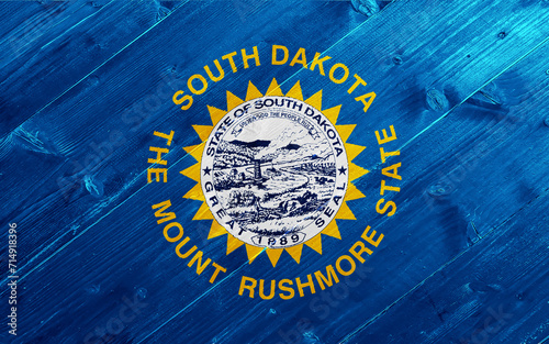 Flag of South Dakota USA state on a textured background. Concept collage.