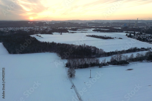 Winter Sunset over Snowy Landscape © Christopher