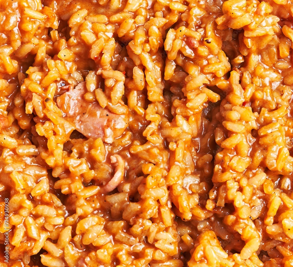 Close-up of creamy risotto with mushrooms, a classic italian dish, perfect for culinary backgrounds. Close-up of creamy risotto with mushrooms, a classic italian dish, perfect for culinary backgrounds.