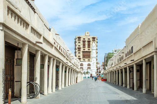 Al-Balad old town central walking street with traditional muslim and mosque, Jeddah, Saudi Arabia photo