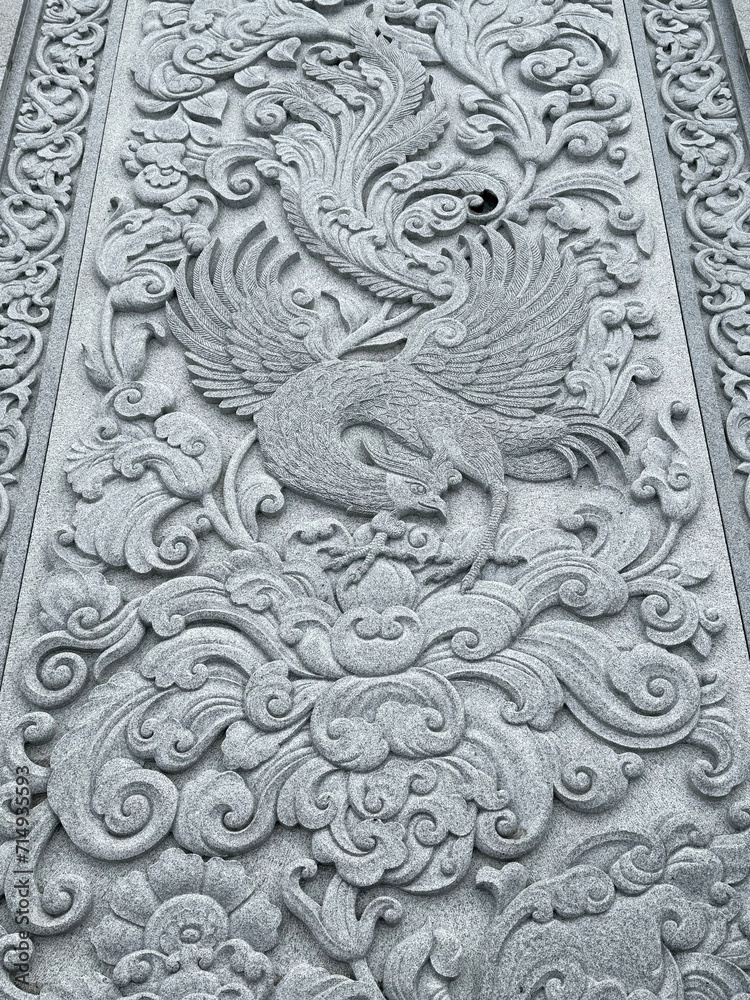 Engraving with Chinese theme pattern on Ngong Ping Tian Tian Buddha grand staircase.