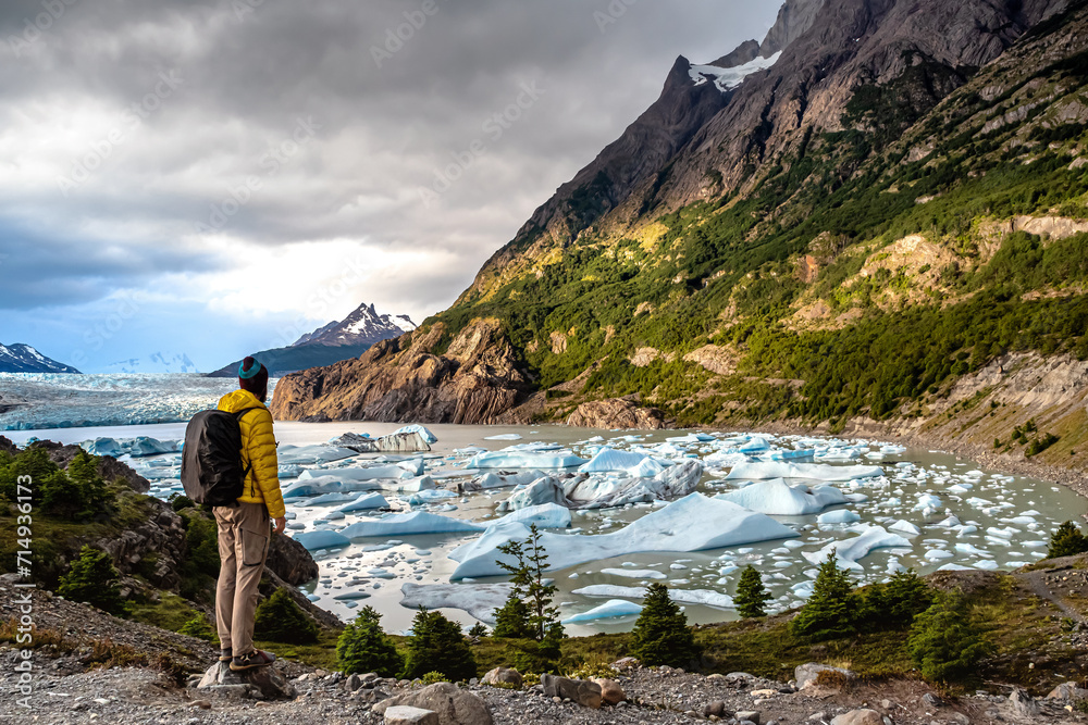Hiker in front Grey Glacier in the Southern Patagonian Ice Field, Chile