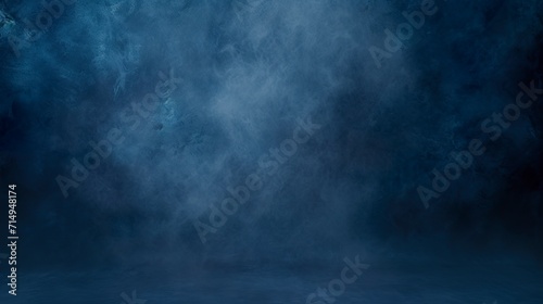 Dark blue abstract background in cyclorama style in misty atmosphere. Opulent setting of extra depth in misty dark blue color. photo