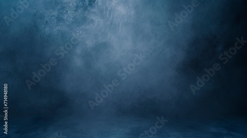 Dark blue abstract background in cyclorama style in misty atmosphere. Opulent setting of extra depth in misty dark blue color.