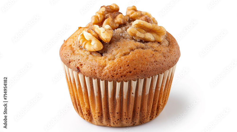 banana muffin topped with walnut pieces isolated on a white background. banana muffin topped with walnut pieces isolated on a white background.