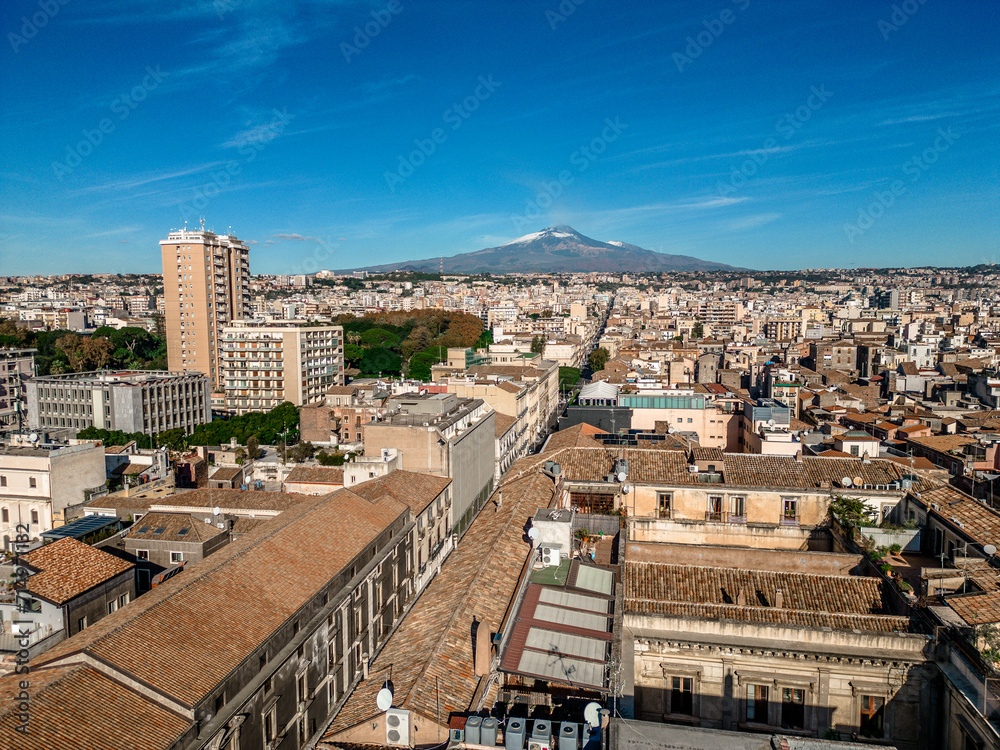 View of the city of Catania with the Etna volcano