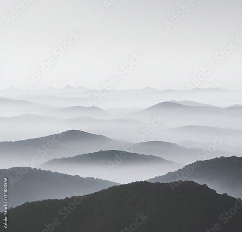 Mountains in the fog. Beautiful background with empty copy space. Mountain peak with clouds. Minimalist backdrop. Nature, success, travel, holiday concept 