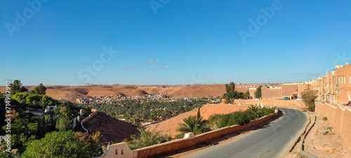 Panoramic view from the beautiful district of Ksar Tafilelt. With its houses made of clay and stones, typical sub-Saharan desert architecture, Ghardaïa, Oasis M'zab, Algeria