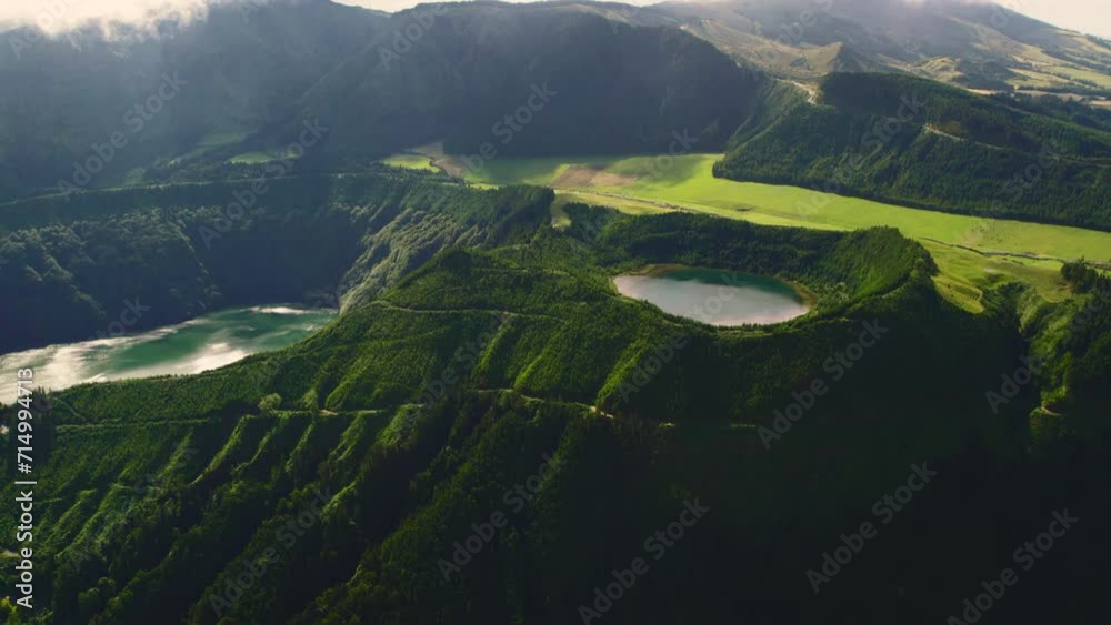 Aerial shot, drone point of view, Boca do Inferno. Picturesque lakes in volcanoes craters. San Miguel, Ponta Delgada island, Azores, Portugal. Bird eye view. Landmarks and natural wonders concept 