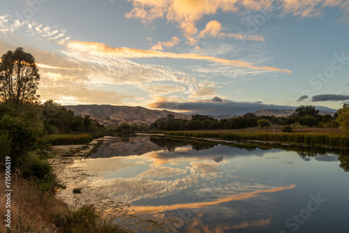 Pleasants Valley Road along Lake Solano in the sunset featuring the Vacca Mountains, California, USA 
