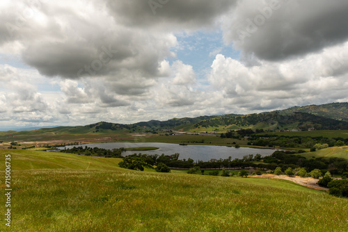 The Lagoon Valley Park lake in Vacaville, California, USA, viewed from a hill, including the highway I-80 at a distance