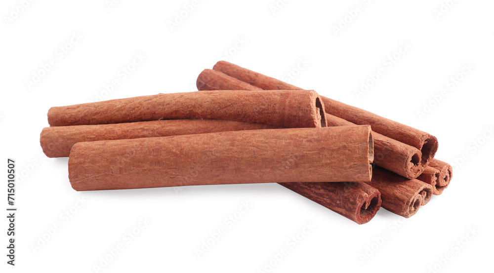 Dry aromatic cinnamon sticks isolated on white Dry aromatic cinnamon sticks isolated on white