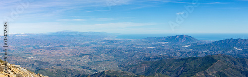 Panoramic view on Mediterranean sea and Malaga from the Torrecilla peak, Sierra de las Nieves national park, Andalusia, Spain