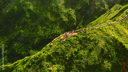 Drone point of view tourists visited Boca do Inferno hiking trail with picturesque view of large volcanic crater lake Sete Cidades. San Miguel, Ponta Delgada island, Azores, Portugal. Travel concept photo