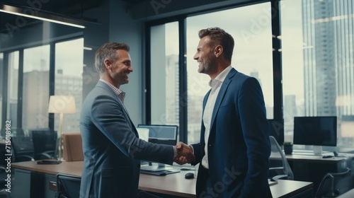 Business handshake and business people concept, partnership and business people shaking hands in the office for a deal.