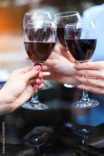 Close up of hands of a friends toasting