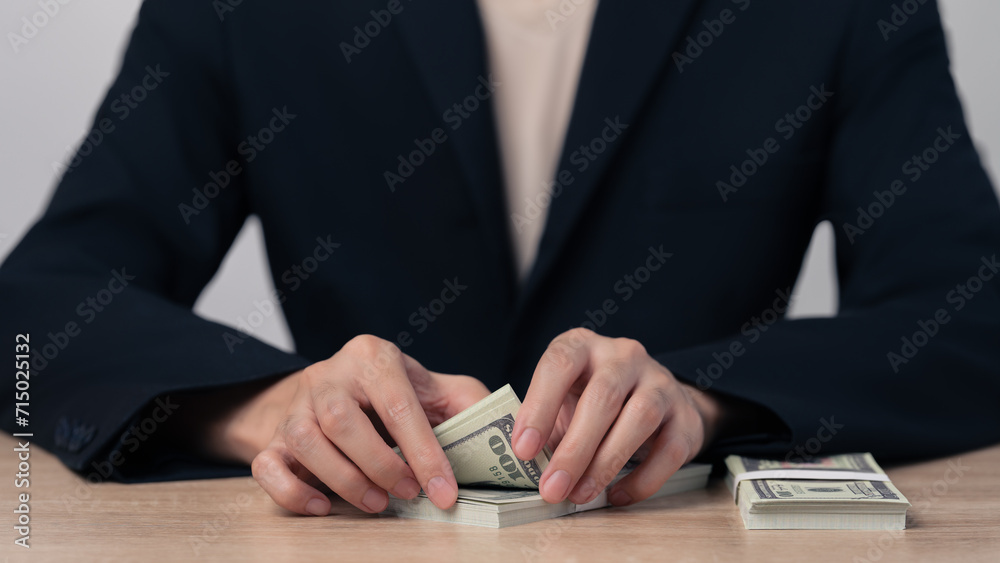 Businessman counting US dollar bills, Bank employee doing financial transactions for customers, Investment concept, Returns